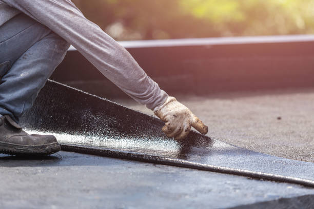 Professional Basement Waterproofing technician working in Campbellsburg, KY